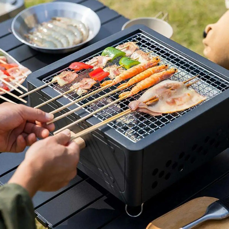 Przenośny grill węglowy na kem – Camping Cooking Grill recenzja i cena